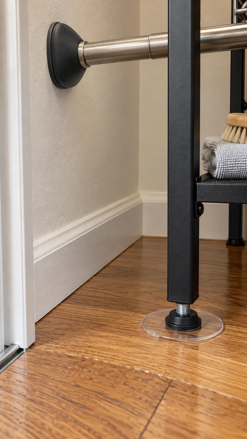Closet rod pads and freestanding frame feet protecting rental surfaces