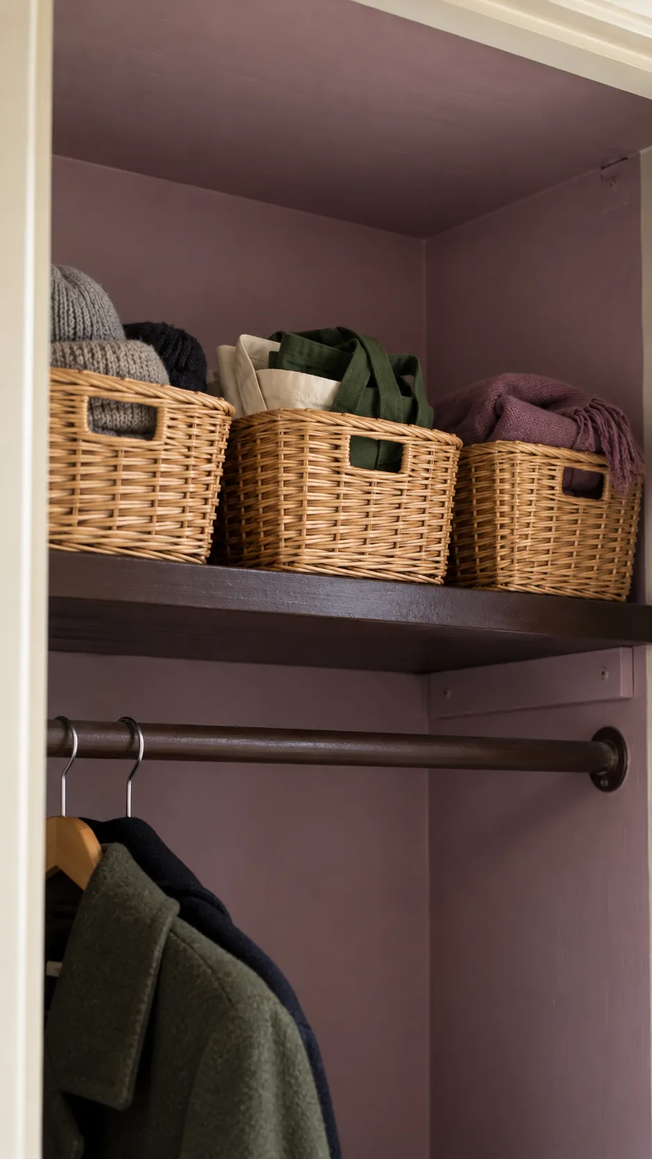 Small lightweight baskets on an existing hall closet shelf