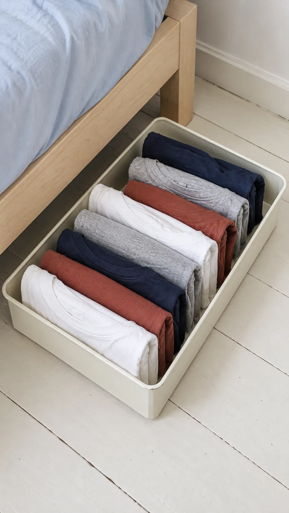 Stand folded tees in short rows for a small bedroom without a dresser