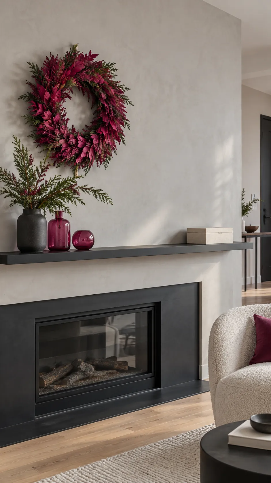 Magenta Christmas wreath with simple greenery and open mantel space