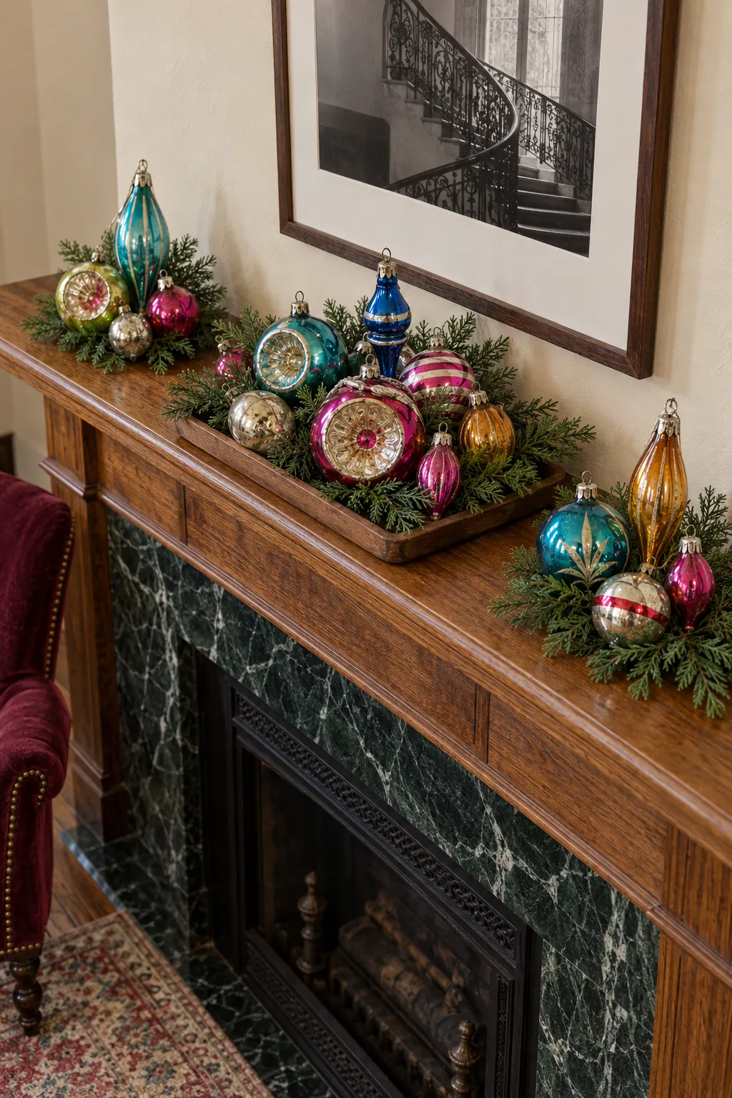 Retro colorful glass ornament collection arranged on cedar mantel greenery