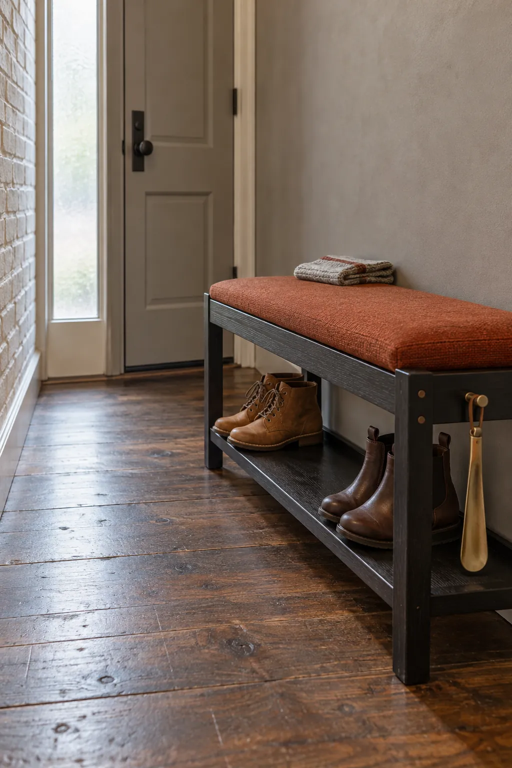Narrow entryway bench with open storage for ankle boots
