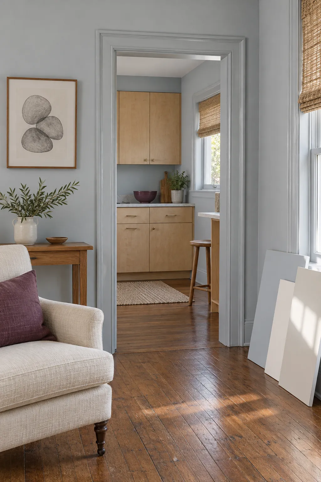Connected small rooms with a continuous light color palette