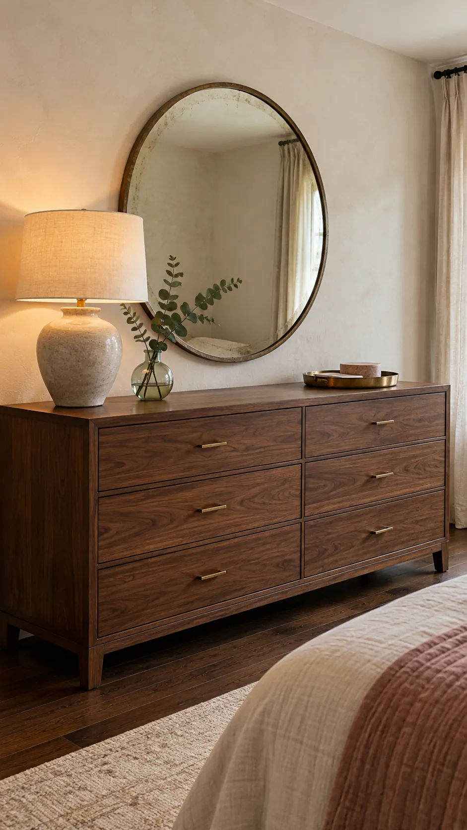 Balanced dresser vignette in an inviting large bedroom